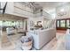 Open floor plan offering spacious living and kitchen areas with high ceilings and natural light at 2414 Goldbug Ave, Sullivans Island, SC 29482