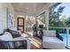 Relaxing patio with outdoor seating, grill, and views of the pool and backyard at 2414 Goldbug Ave, Sullivans Island, SC 29482