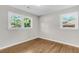 Bedroom features hardwood floors and natural light from the windows at 245 Clarine Dr, Goose Creek, SC 29445