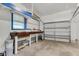 An empty garage with workbench and room for a car and other tools and equipment at 245 Clarine Dr, Goose Creek, SC 29445
