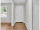 Hallway showing hardwood floors, fresh paint, and an exterior view through a window at 245 Clarine Dr, Goose Creek, SC 29445