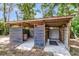 Open outdoor shed on a property with wooden beams and a shaded corrugated metal roof at 245 Clarine Dr, Goose Creek, SC 29445