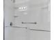 A newly renovated shower with updated fixtures, safety bars and modern lighting at 245 Clarine Dr, Goose Creek, SC 29445