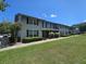 Attractive two-story townhomes with black shutters and manicured lawns offer comfortable living in a desirable community at 2494 Etiwan Ave # 3I, Charleston, SC 29414
