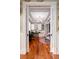 Bright home office featuring custom built-ins, hardwood floors, and ample workspace at 2705 Parkers Landing Rd, Mount Pleasant, SC 29466