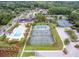 Aerial view of a community pool, tennis courts, clubhouse and extensive parking at 3028 River Vista Drive Way, Mount Pleasant, SC 29466