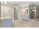 Large bathroom with double vanities, large mirrors, and a glass shower at 3028 River Vista Drive Way, Mount Pleasant, SC 29466