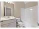 Bathroom featuring a white vanity, tub/shower combo with white tile surround and updated fixtures at 3028 River Vista Drive Way, Mount Pleasant, SC 29466