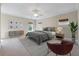 Comfortable main bedroom with a ceiling fan, nice windows, and neutral decor at 3028 River Vista Drive Way, Mount Pleasant, SC 29466