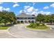 Scenic view of a stately clubhouse with lush landscaping, creating an inviting community gathering space at 3028 River Vista Drive Way, Mount Pleasant, SC 29466