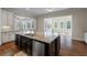 Kitchen island has a stainless steel dishwasher and a breakfast bar at 3028 River Vista Drive Way, Mount Pleasant, SC 29466
