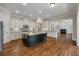 Open kitchen features stainless steel appliances, large island, and hardwood floors at 3028 River Vista Drive Way, Mount Pleasant, SC 29466