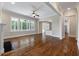Spacious living room boasts hardwood floors, lots of natural light, and elegant trim work at 3028 River Vista Drive Way, Mount Pleasant, SC 29466
