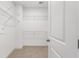 Walk-in closet with adjustable, wire shelving for organization at 3028 River Vista Drive Way, Mount Pleasant, SC 29466