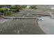 A beautiful property featuring a marshy landscape with a long private dock extending into the water at 31 Seagrass Ln, Isle of Palms, SC 29451
