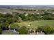 Aerial view of a house and golf course located in a low country community at 31 Seagrass Ln, Isle of Palms, SC 29451