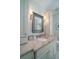 Bathroom vanity featuring granite counters and ample cabinet space at 31 Seagrass Ln, Isle of Palms, SC 29451