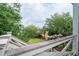 Overhead view of the property from the deck with flowers in a hanging planter at 31 Seagrass Ln, Isle of Palms, SC 29451