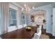 Stylish dining room open to the kitchen, featuring a large table and modern decor at 31 Seagrass Ln, Isle of Palms, SC 29451