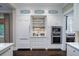 Custom kitchen with white cabinetry, stainless steel appliances, and ample storage at 31 Seagrass Ln, Isle of Palms, SC 29451