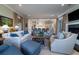 Spacious living room with neutral furnishings, fireplace, and open access to the kitchen at 31 Seagrass Ln, Isle of Palms, SC 29451