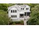 The rear exterior of the home has multiple levels, including a screened porch at 31 Seagrass Ln, Isle of Palms, SC 29451