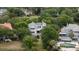 Elegant home featuring a screened porch and well-manicured backyard, perfect for outdoor living at 31 Seagrass Ln, Isle of Palms, SC 29451