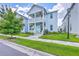 Charming two-story home with a welcoming front porch and beautiful landscaping at 312 Cypress Knee Landing, Summerville, SC 29483