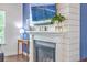 Elegant fireplace with shiplap accent wall and mounted TV, perfect for cozy evenings in the living room at 312 Cypress Knee Landing, Summerville, SC 29483