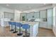 Spacious kitchen featuring gray cabinetry, stainless steel appliances, and center island with bar seating at 312 Cypress Knee Landing, Summerville, SC 29483