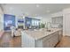 Bright living room with a fireplace, adjoined to the kitchen and dining area, perfect for entertaining at 312 Cypress Knee Landing, Summerville, SC 29483