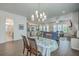 Spacious open-concept living space featuring hardwood floors, eat-in kitchen, and a dining room at 312 Cypress Knee Landing, Summerville, SC 29483
