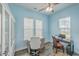 Well-lit office with hardwood floors, two windows, and built-in shelving perfect for productivity at 312 Cypress Knee Landing, Summerville, SC 29483