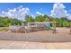 Community playground featuring a boat structure with a slide and picnic tables in a natural setting at 312 Cypress Knee Landing, Summerville, SC 29483