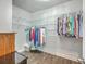 A walk-in closet with built-in shelving provides ample storage space for an organized wardrobe at 312 Cypress Knee Landing, Summerville, SC 29483