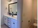 Bright bathroom featuring a double vanity with ample storage and updated fixtures at 317 Whispering Breeze Ln, Summerville, SC 29486