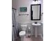 A bathroom featuring a pedestal sink, toilet and patterned shower curtain at 317 Whispering Breeze Ln, Summerville, SC 29486