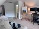 Bonus room featuring an art easel, couch and desk with computer monitors at 317 Whispering Breeze Ln, Summerville, SC 29486