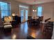 A cozy dining room shows natural light and a place to entertain at 317 Whispering Breeze Ln, Summerville, SC 29486