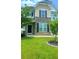 Charming home featuring a manicured lawn and stone facade with a tasteful front door at 322 Braken Fern Rd, Moncks Corner, SC 29461