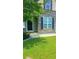 Exterior shot of a home featuring a manicured lawn and stone facade at 322 Braken Fern Rd, Moncks Corner, SC 29461