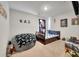 Cozy bedroom features a trundle bed, a gaming beanbag, and playful decor at 324 Spruce Ivy St, Moncks Corner, SC 29461