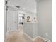 Upstairs hallway with carpet, a partial view of a living area, and neutral colored walls at 324 Spruce Ivy St, Moncks Corner, SC 29461