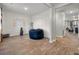Open-concept living area with a comfy beanbag and seamless flow, perfect for relaxation and entertainment at 324 Spruce Ivy St, Moncks Corner, SC 29461