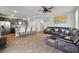 Inviting open-concept living room with a modern kitchen, ideal for seamless entertaining and Gathering gatherings at 324 Spruce Ivy St, Moncks Corner, SC 29461
