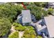 Overhead view of a home with a back deck, nestled among trees in a quiet neighborhood at 341 Seabrook Island Rd, Seabrook Island, SC 29455