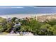 Aerial shot of a charming beach house with easy access to the sandy shores and ocean views at 341 Seabrook Island Rd, Seabrook Island, SC 29455