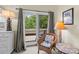 Cozy balcony seating area with an outdoor view of greenery at 341 Seabrook Island Rd, Seabrook Island, SC 29455