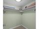 Walk-in closet with built-in shelving, carpet and overhead lighting at 341 Seabrook Island Rd, Seabrook Island, SC 29455