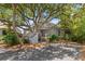 Charming exterior of home, shaded by mature trees, features a welcoming entryway and lush landscaping at 341 Seabrook Island Rd, Seabrook Island, SC 29455